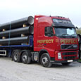 Delivering the pipes for a new watermain in Devon